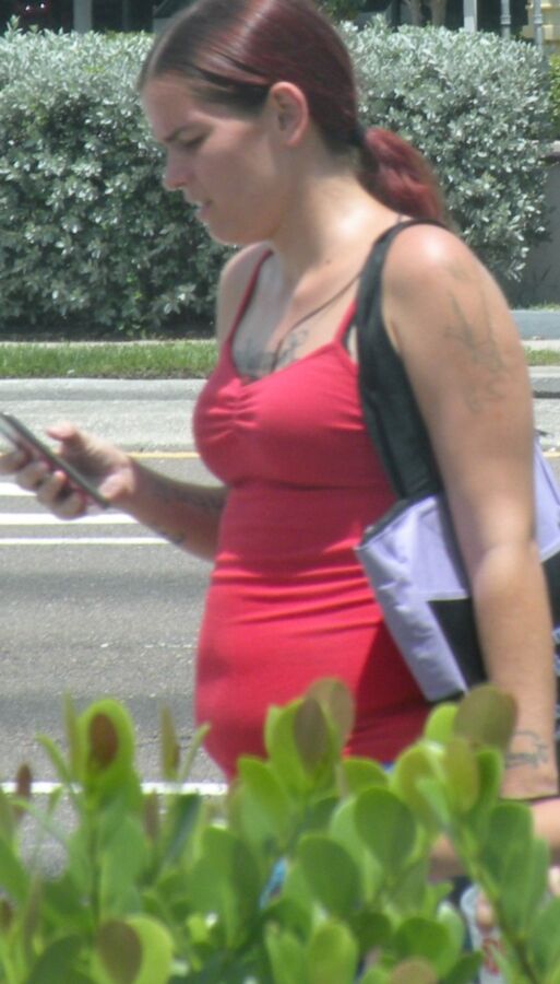 Thick bellied momma in TIGHT RED top CUTE BELLY looks SO fun 4 of 4 pics