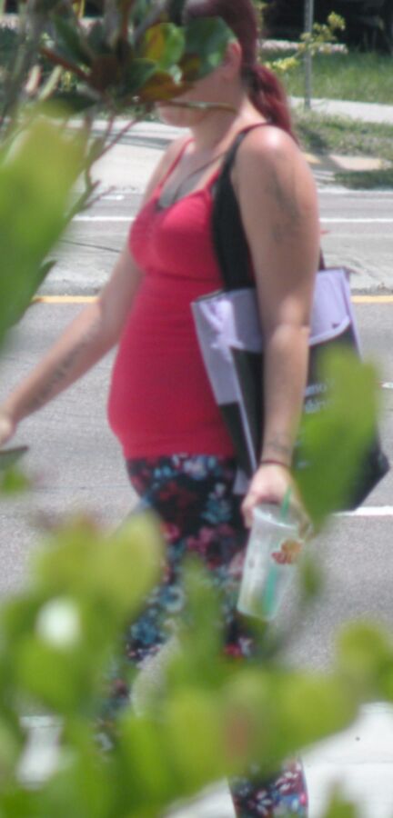 Thick bellied momma in TIGHT RED top CUTE BELLY looks SO fun 3 of 4 pics
