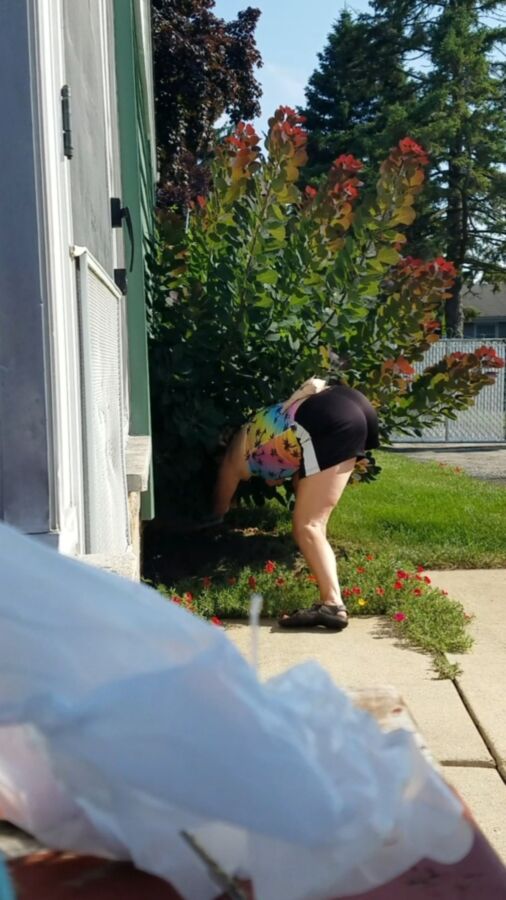 Lori doing yard work braless for me  7 of 50 pics