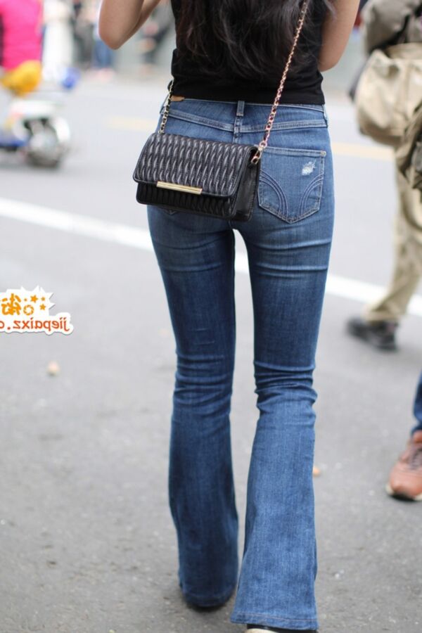 Tempting tight jeans on that Asian round ass 12 of 18 pics