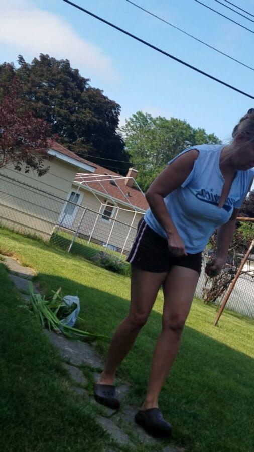 Lori doing yard work braless for me  19 of 50 pics