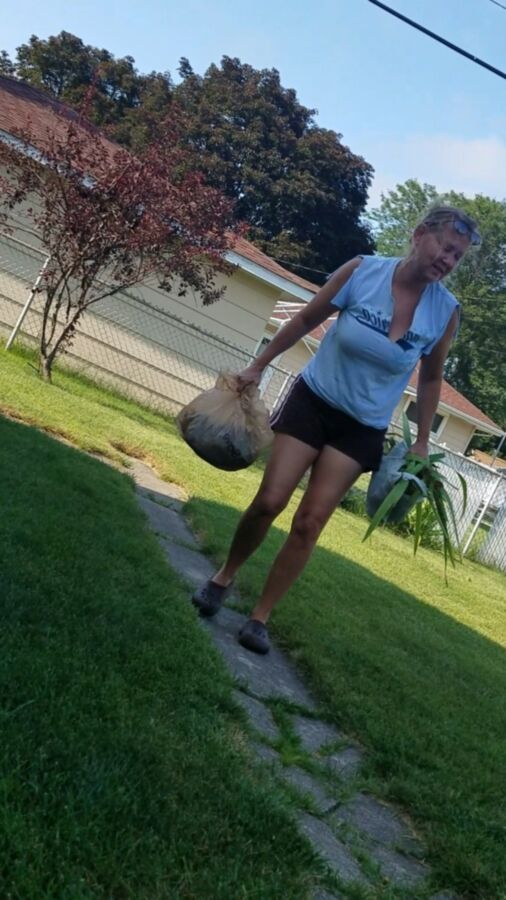 Lori doing yard work braless for me  10 of 50 pics