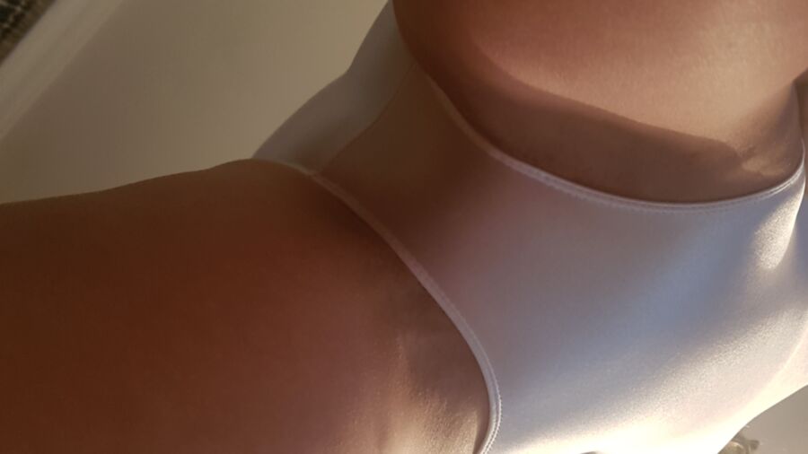 Jo in a shiny tight white leotard 1 of 19 pics