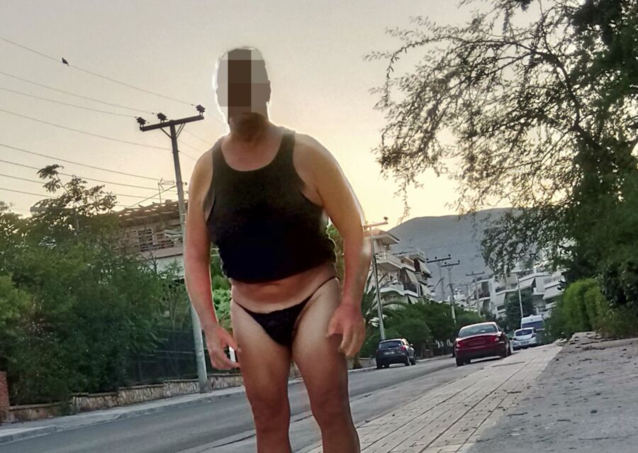 Outdoors in the streets undresing with panties 16 of 27 pics