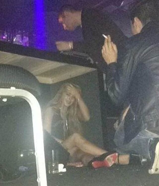 Lindsay Lohan Under a Table in a Nightclub in Sao Paulo 1 of 1 pics