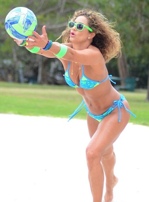 Jennifer Nicole Lee wearing a bikini, playing beach volleyball 9 of 12 pics