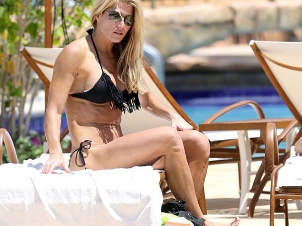 Torrie Wilson - Bikini in Miami at Poolside 9 of 10 pics