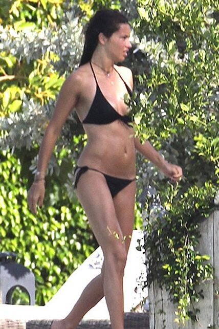 Adriana Lima in Bikini at the Pool at her Miami Mansion 5 of 6 pics