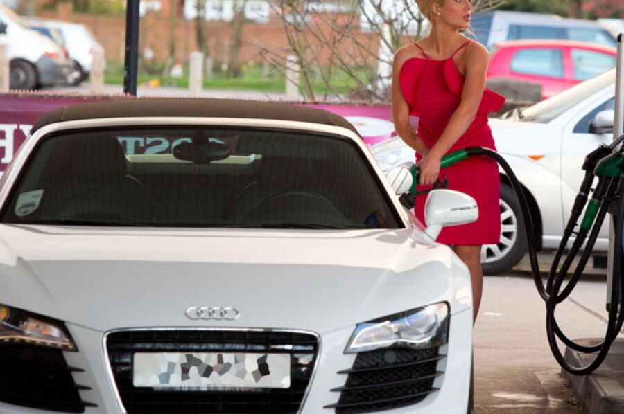 Helen Flanagan in Red Dress and High Heels, filling up her Car 2 of 3 pics