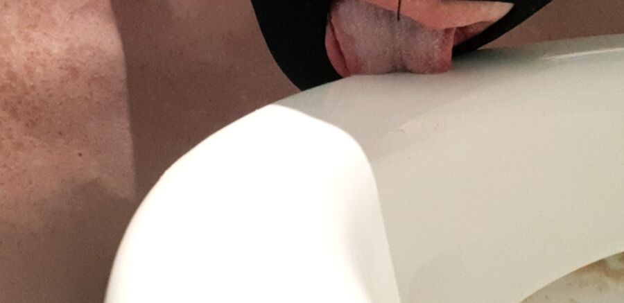 Toilet cleaning with Tongue Humiliation of the slave 4 of 10 pics