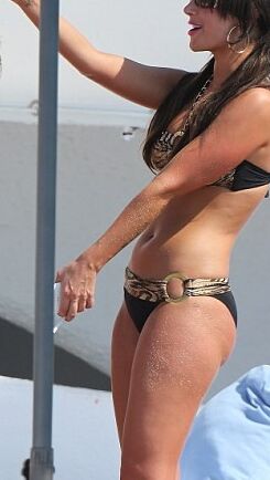 Tulisa Contostavlos in a Black and Gold Zebra Bikini in Marbella 8 of 15 pics