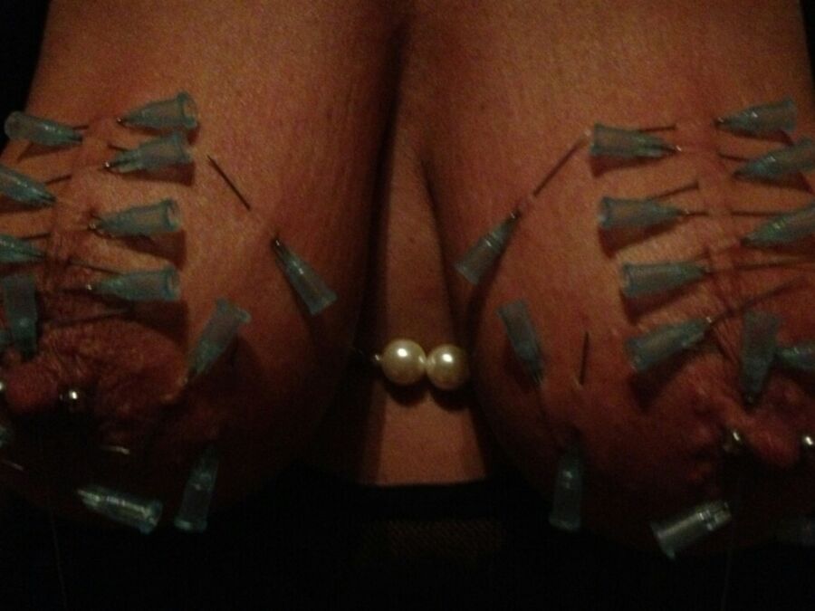Pierced, nailed and tortured mature slave 4 of 21 pics