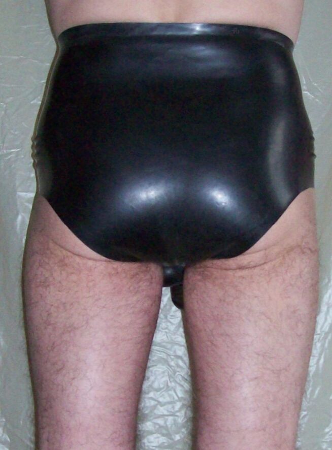 me in black rubber pants  7 of 17 pics