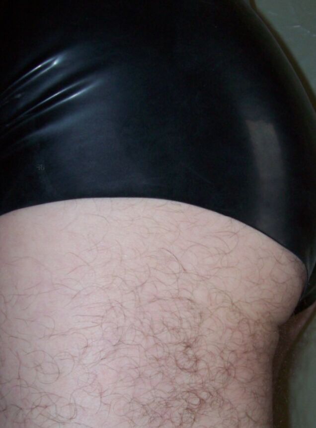 me in black rubber pants  10 of 17 pics