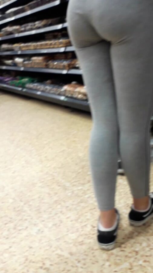 Young Cocktease in tight grey leggings,amazing firm arse 7 of 13 pics