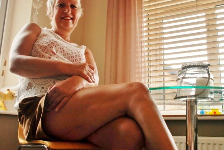 Marika - shorthaired blonde granny posing 4 of 30 pics