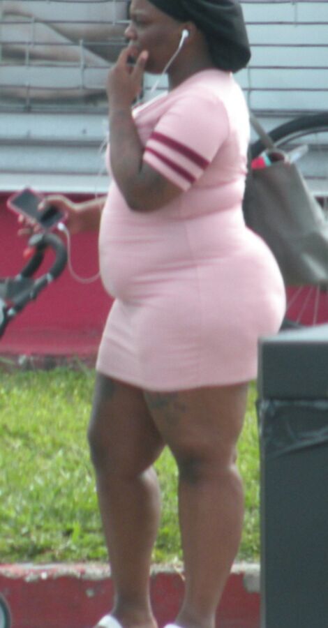 SUPER fat black girl SUPER tight pink dress FAT BELLY & Legs 16 of 17 pics