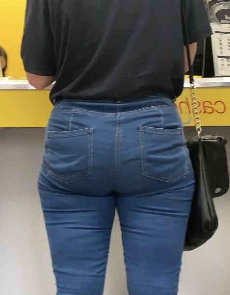 UK milf clenching her ass in jeans  4 of 16 pics