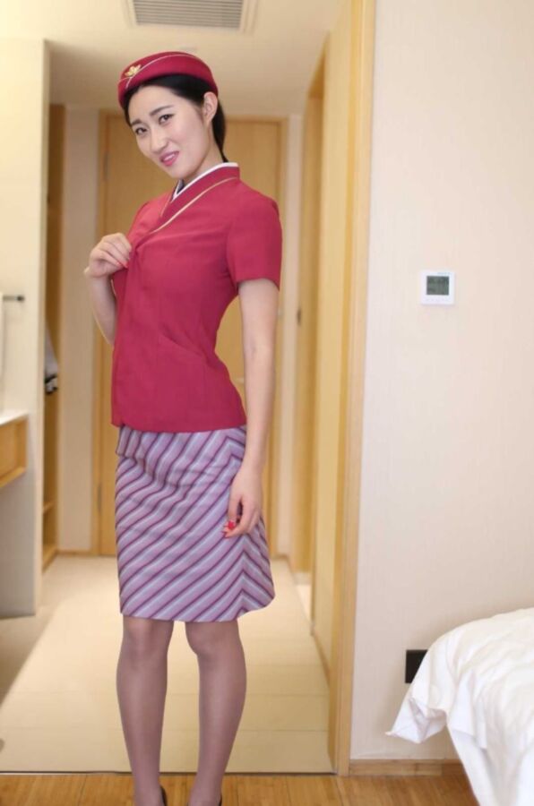 Chinese Flight Attendant Strips out of her Uniform 1 of 44 pics