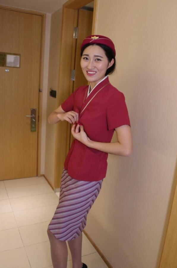 Chinese Flight Attendant Strips out of her Uniform 14 of 44 pics