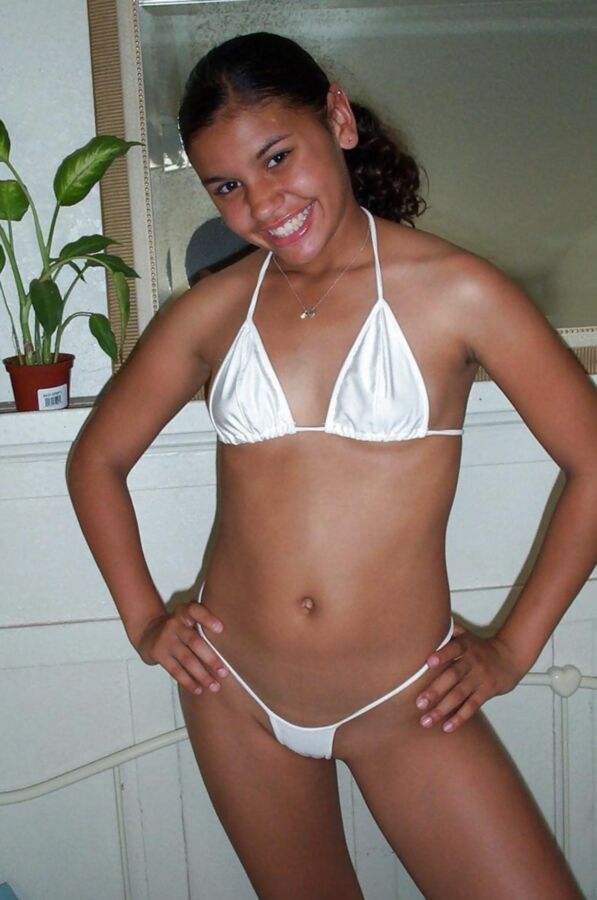 Very Tight Amateur Latina Posing In Micro Bikini 5 of 53 pics