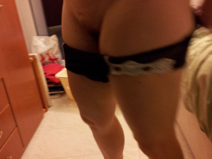 wife putting on underwear 10 of 11 pics