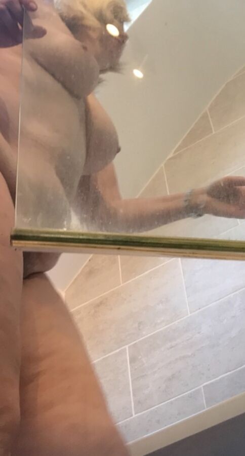 More showering but from a different angle 1 of 6 pics