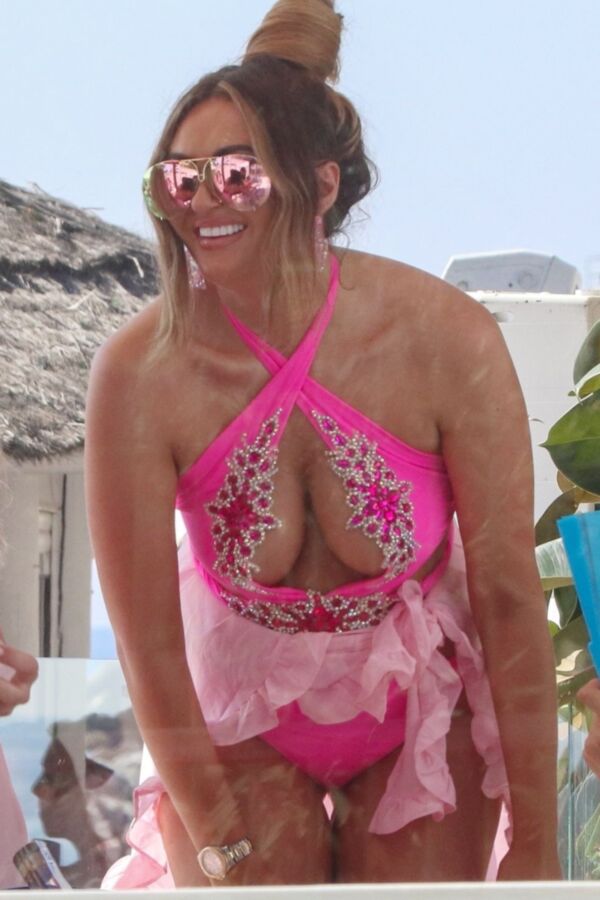 Charlotte Dawson- Busty English Celeb Parties in a Pink Swimsuit 1 of 46 pics