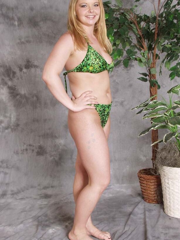 Jessica Strips out of a green bikini 1 of 77 pics