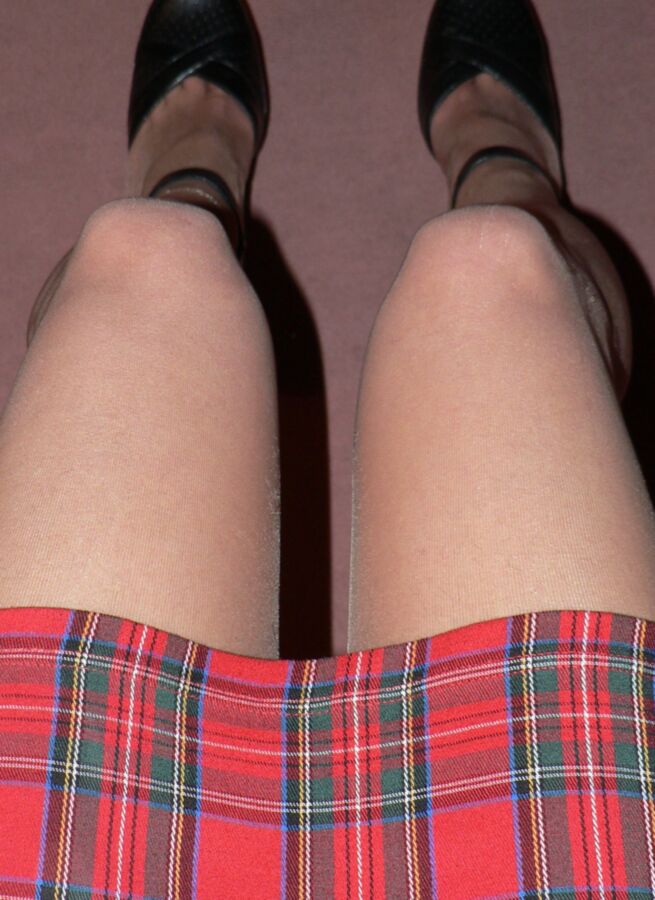 Jade in transparent pantyhose and tartan mini skirt 2 of 10 pics