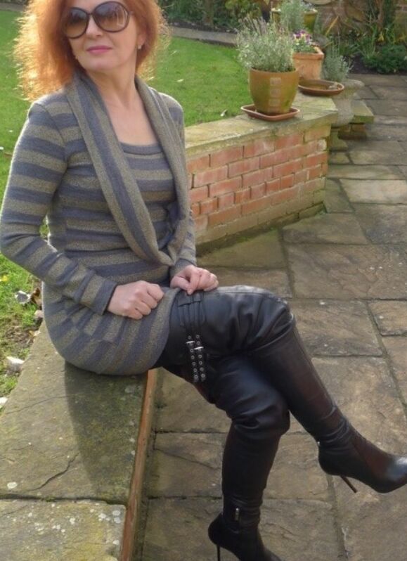 Mature goddess in leather and boots 16 of 18 pics