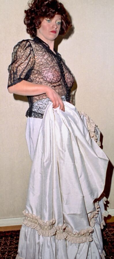 in clothes from bygone days 2 of 5 pics