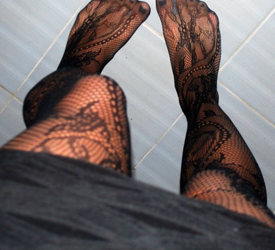 In black floral fishnets 1 of 20 pics