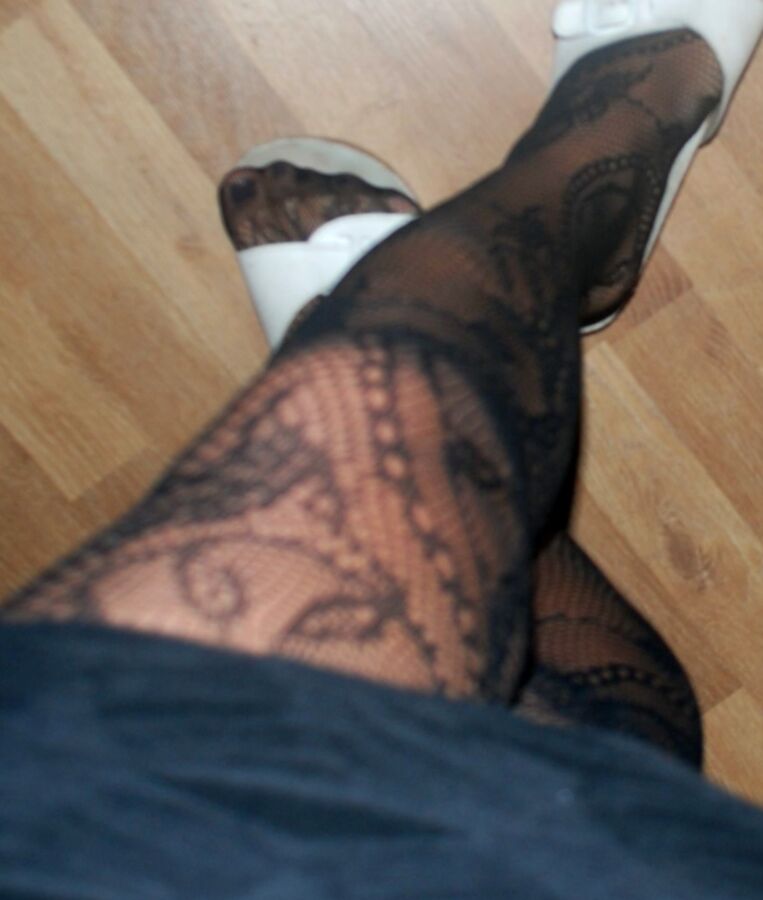 In black floral fishnets 19 of 20 pics
