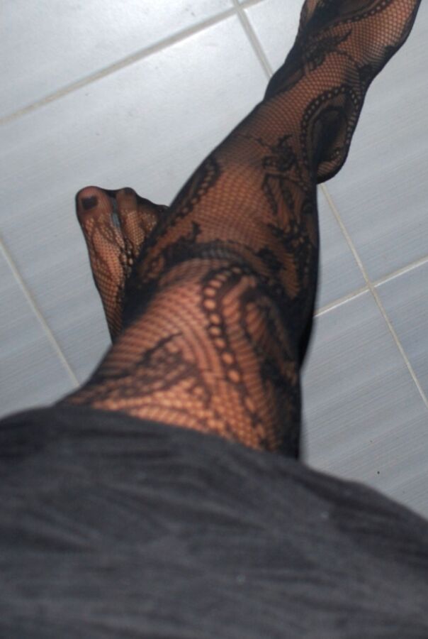 In black floral fishnets 6 of 20 pics