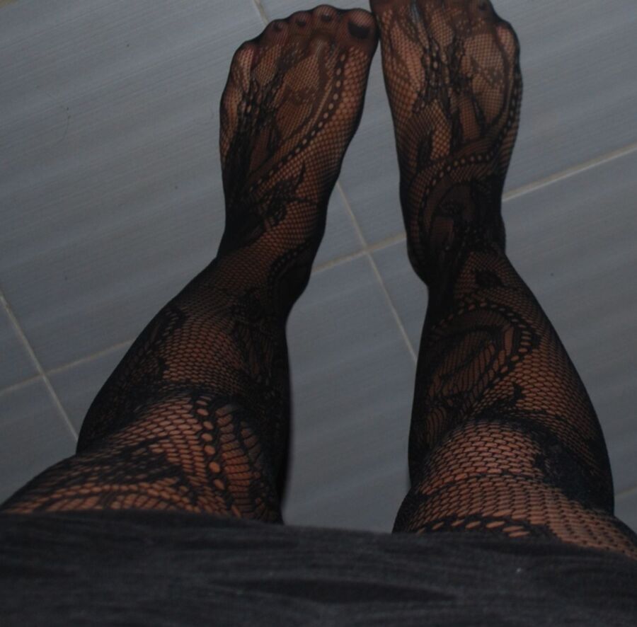 In black floral fishnets 3 of 20 pics