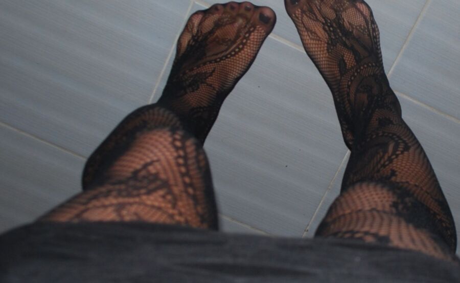 In black floral fishnets 2 of 20 pics