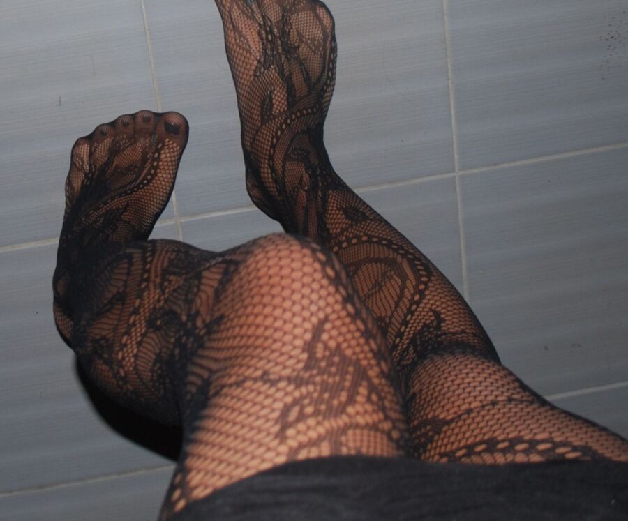In black floral fishnets 7 of 20 pics