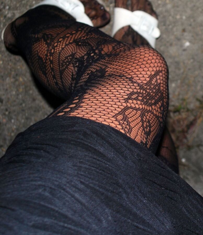 In black floral fishnets 11 of 20 pics