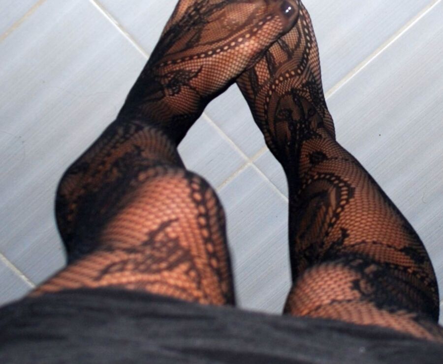 In black floral fishnets 4 of 20 pics