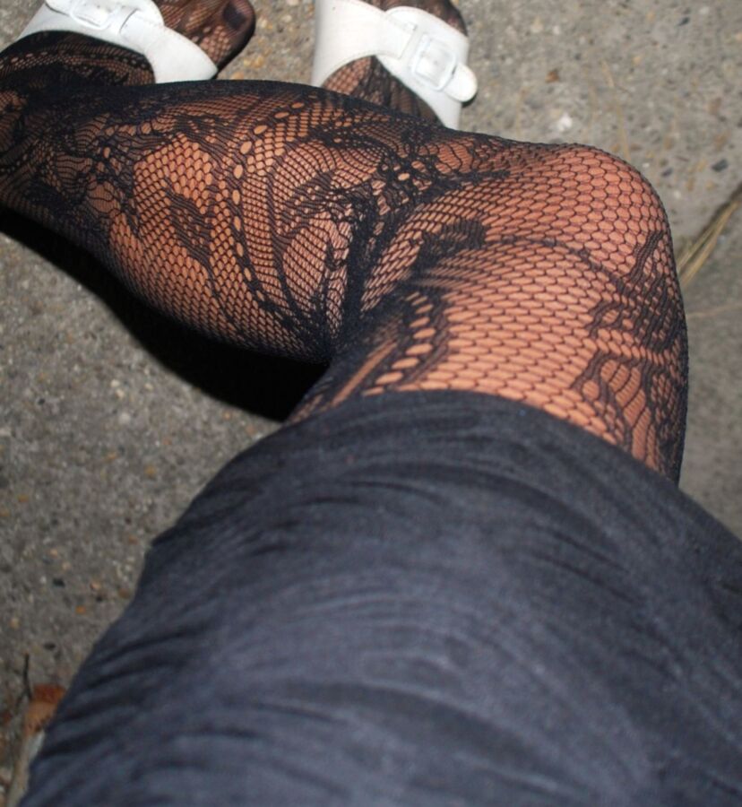 In black floral fishnets 10 of 20 pics