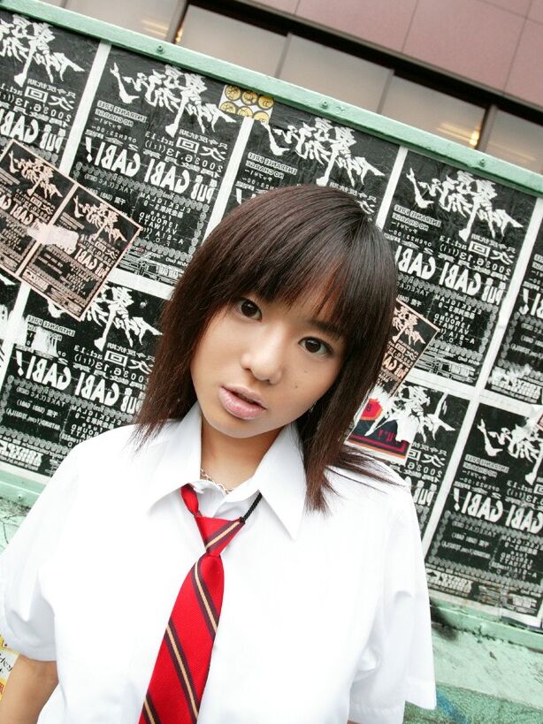 Aoi Sola takes off her school uniform 2 of 40 pics