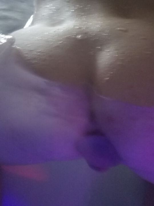 Sissy in hot tub with plug 8 of 11 pics