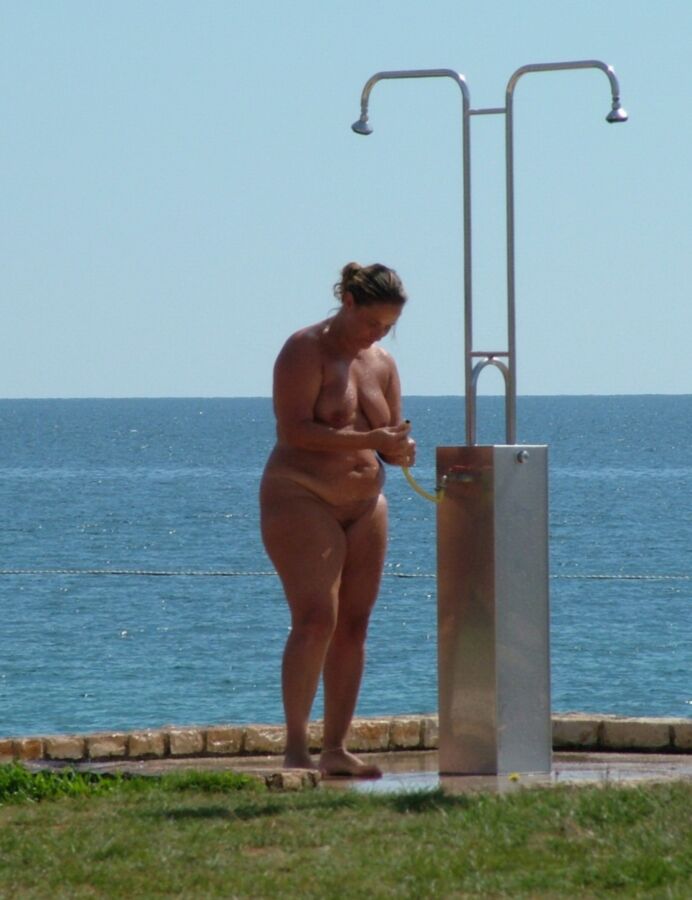 Nudist Beach Showers 11 of 52 pics