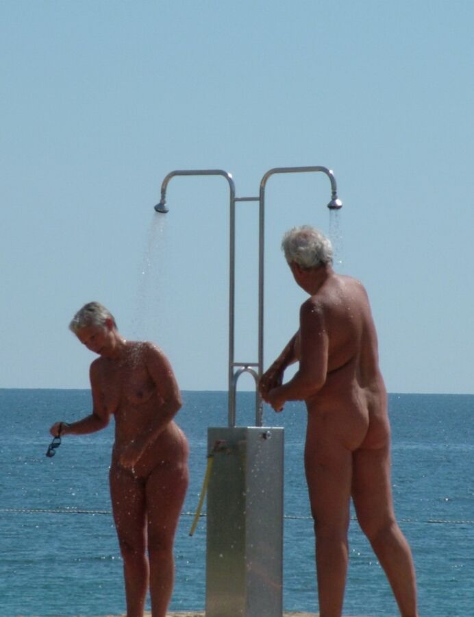 Nudist Beach Showers 17 of 52 pics
