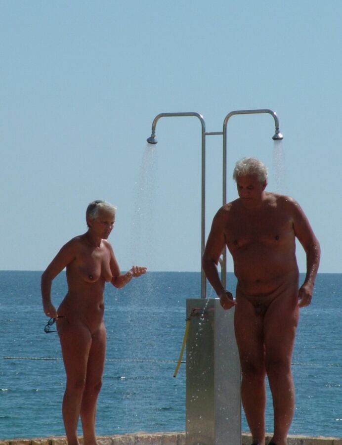 Nudist Beach Showers 16 of 52 pics