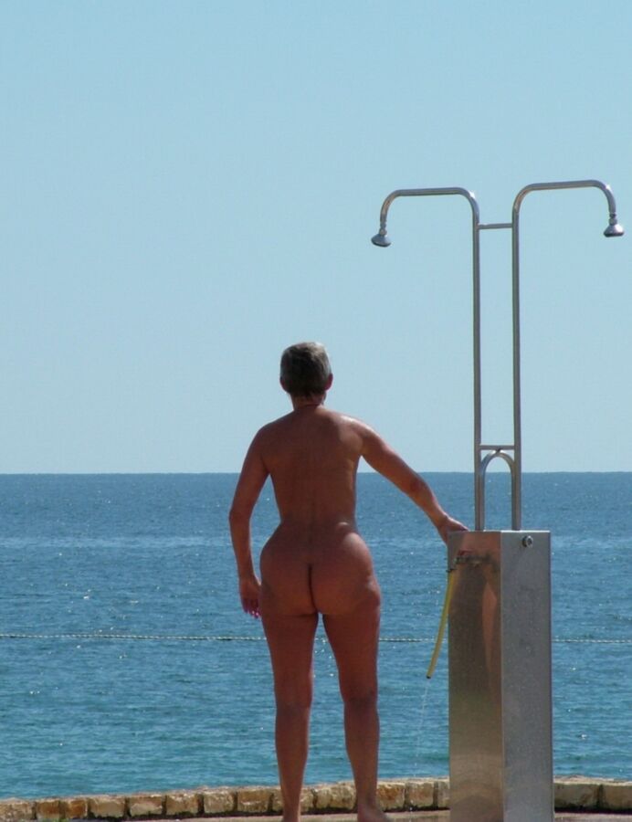 Nudist Beach Showers 12 of 52 pics