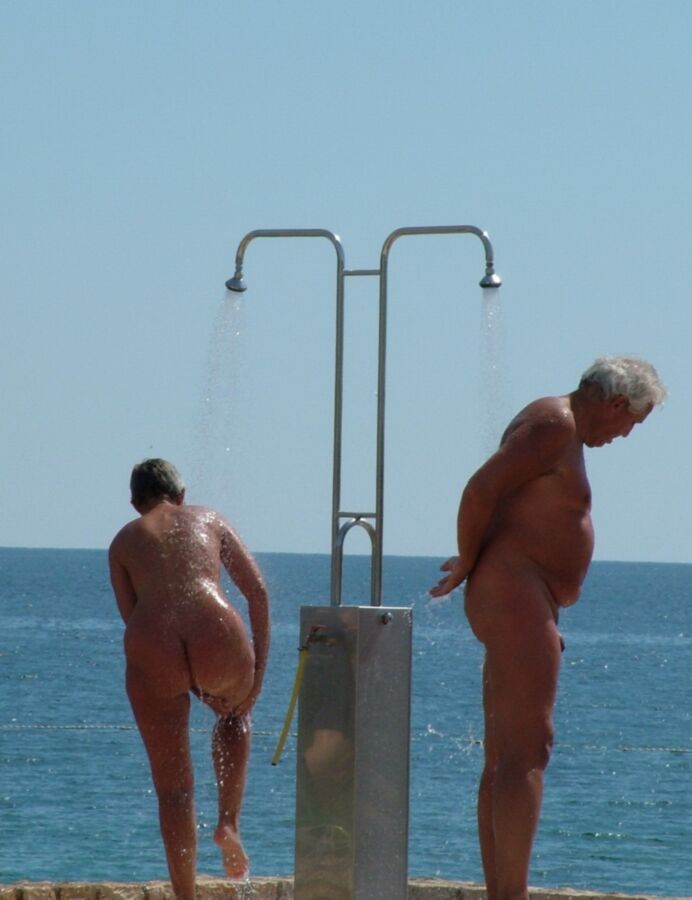 Nudist Beach Showers 14 of 52 pics