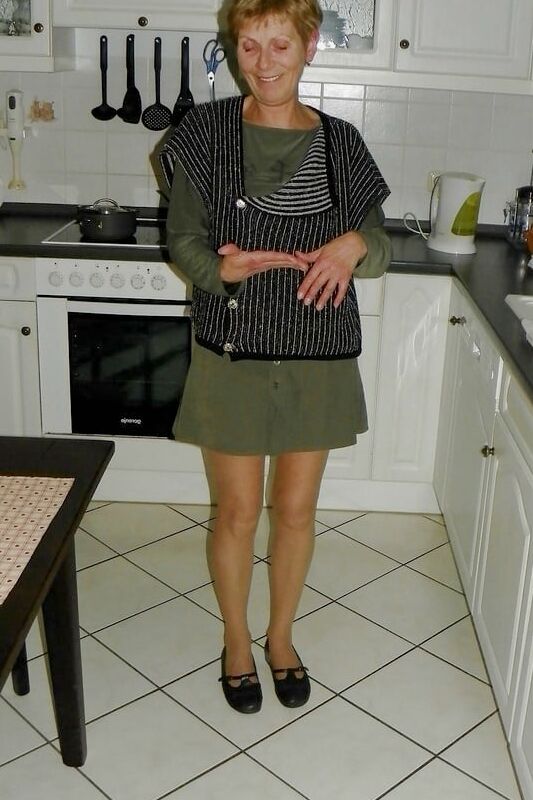 Slim mature, maybe French, MILF teases in pantyhose 20 of 37 pics