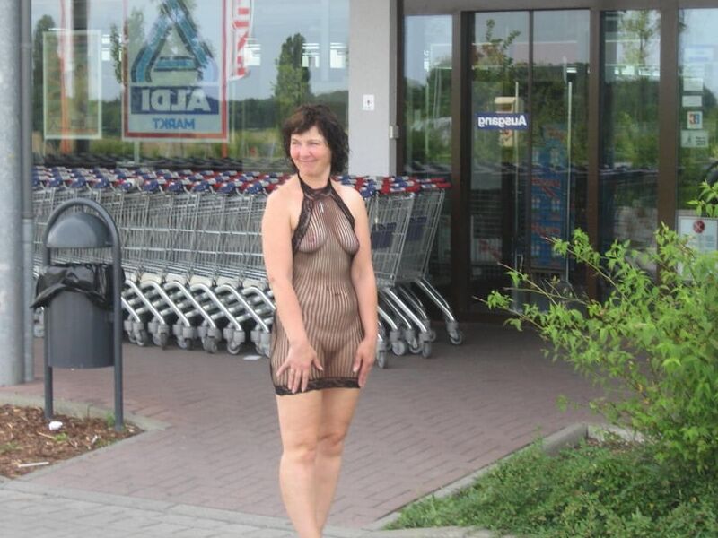 Slutty German wife exposing in public - but who is she? 6 of 68 pics